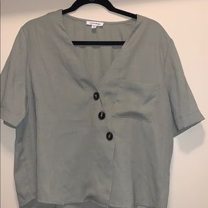 V-neck cloth shirt buttons down the front